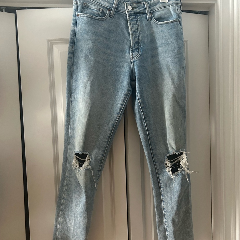 High-Waisted Jeans with Distressed Details